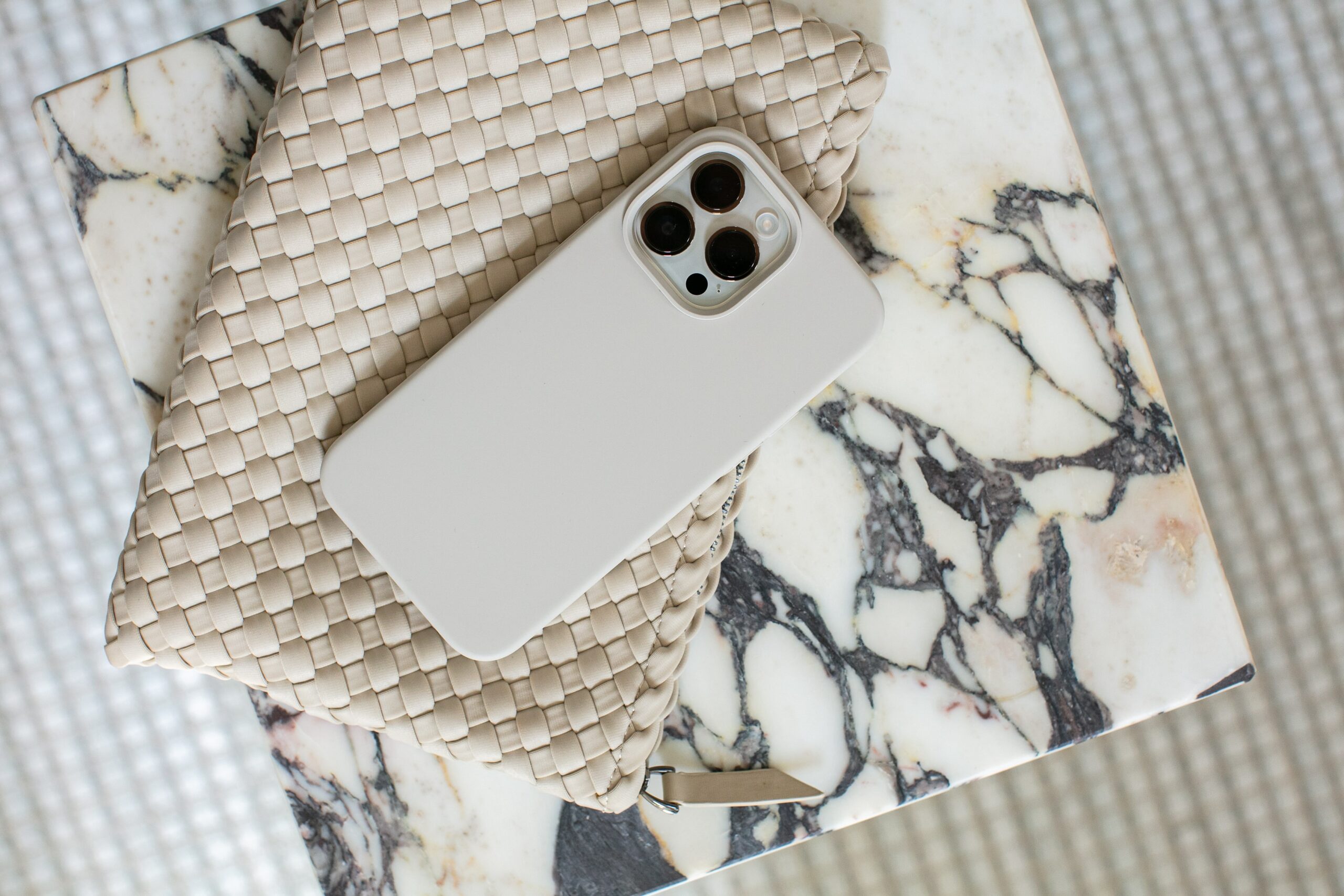 cell phone on a marble countertop | carlisledigitalmarketing.com