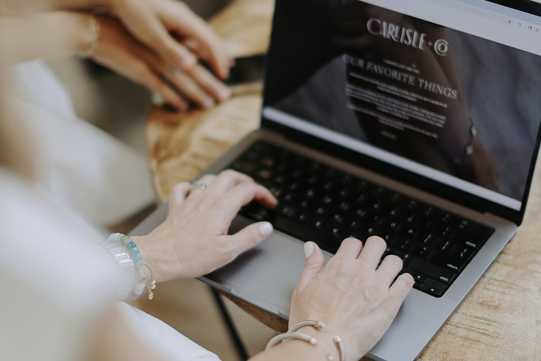 working at a laptop | carlisledigitalmarketing.com